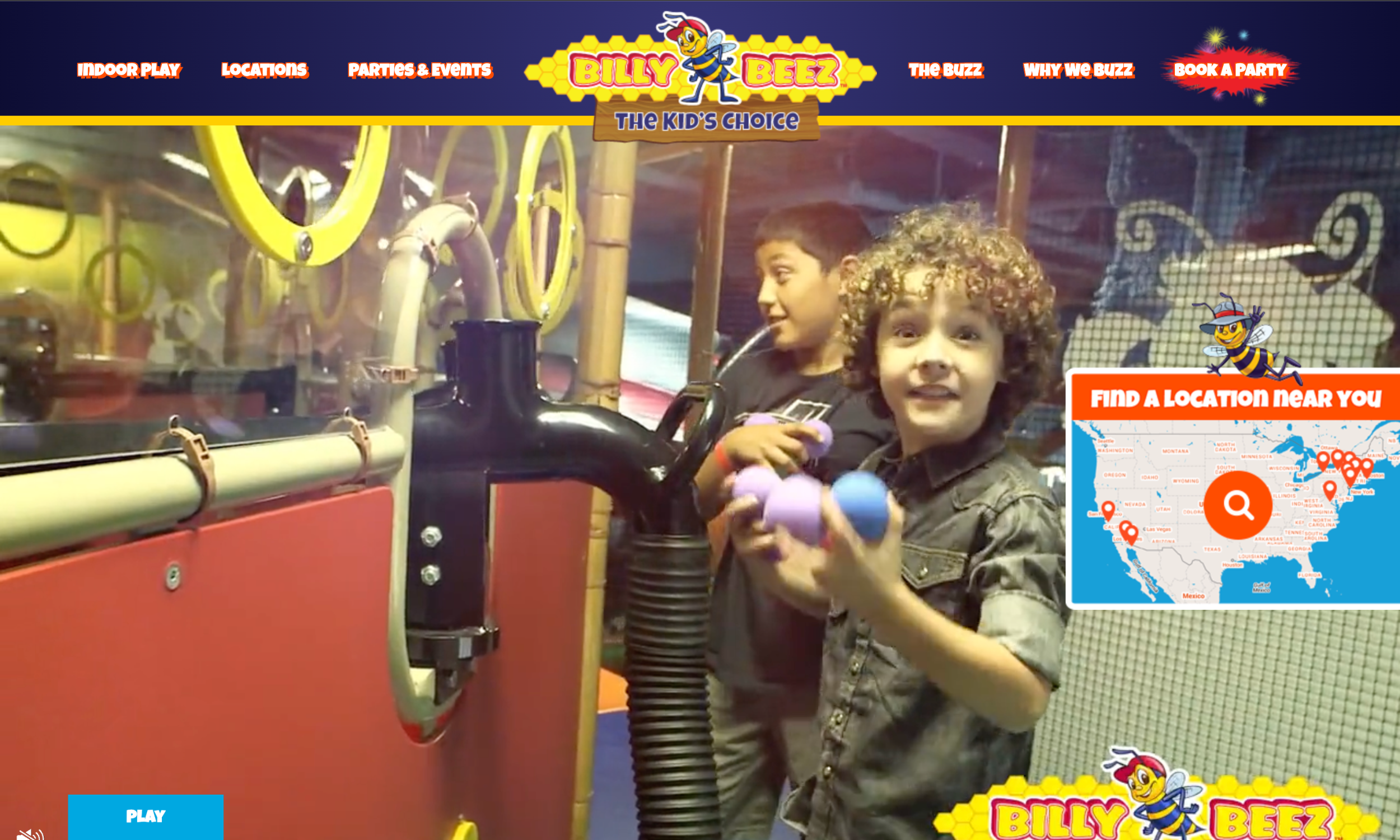 Two children play with foam ball cannons at an indoor playground, with the Billy Beez logo and navigation menu visible at the top of the screen.