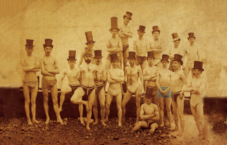 old time photo of men in bathing suits and top hats
