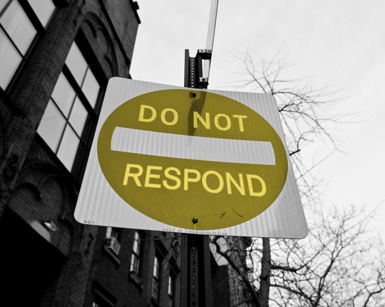 do not respond street sign