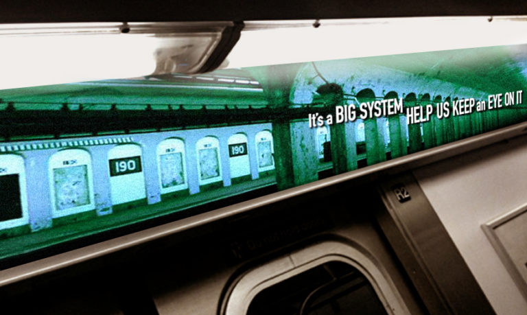 subway advertisement that says it's a big system, help us keep an eye on it