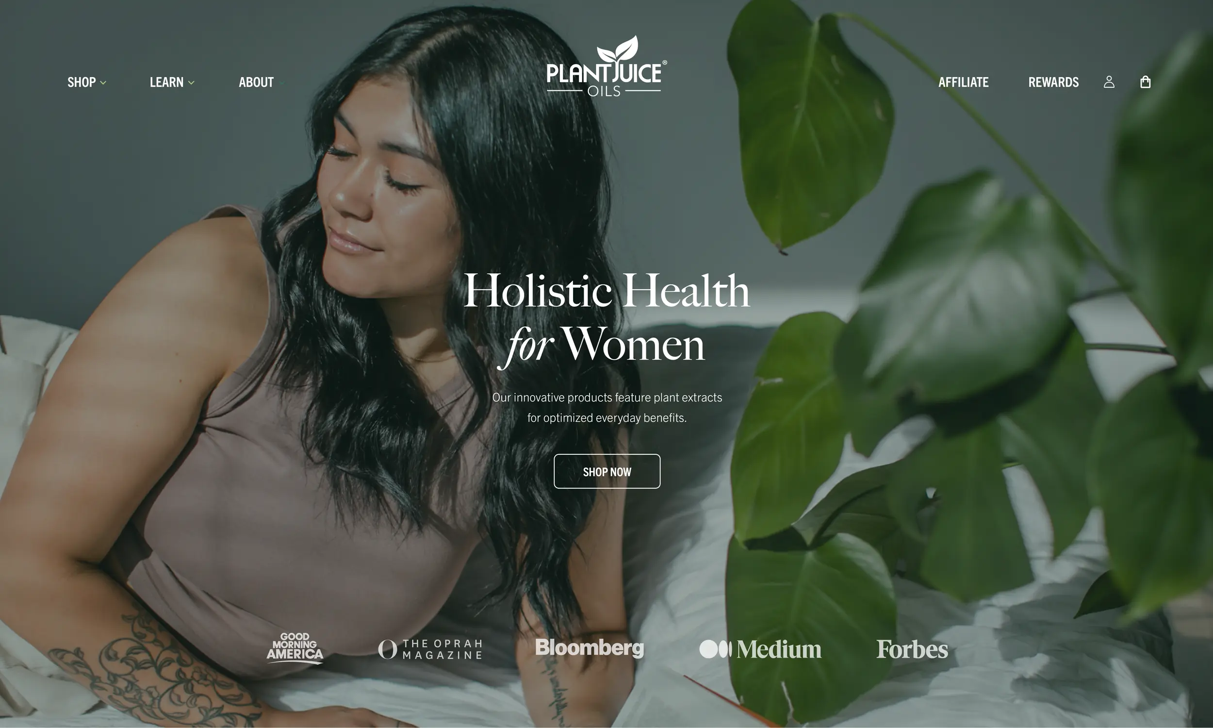 Woman lying on a couch next to green houseplants, with text overlay promoting holistic health for women using plant juice oils and natural plant extracts.