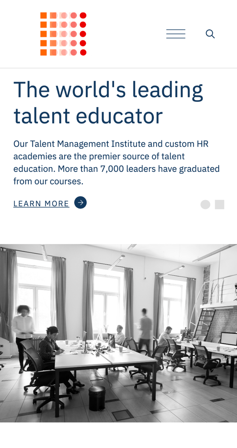 Bright, modern office with large windows and high ceilings, where a leading talent educator inspires productivity—ideal for showcasing innovative hr website design solutions.