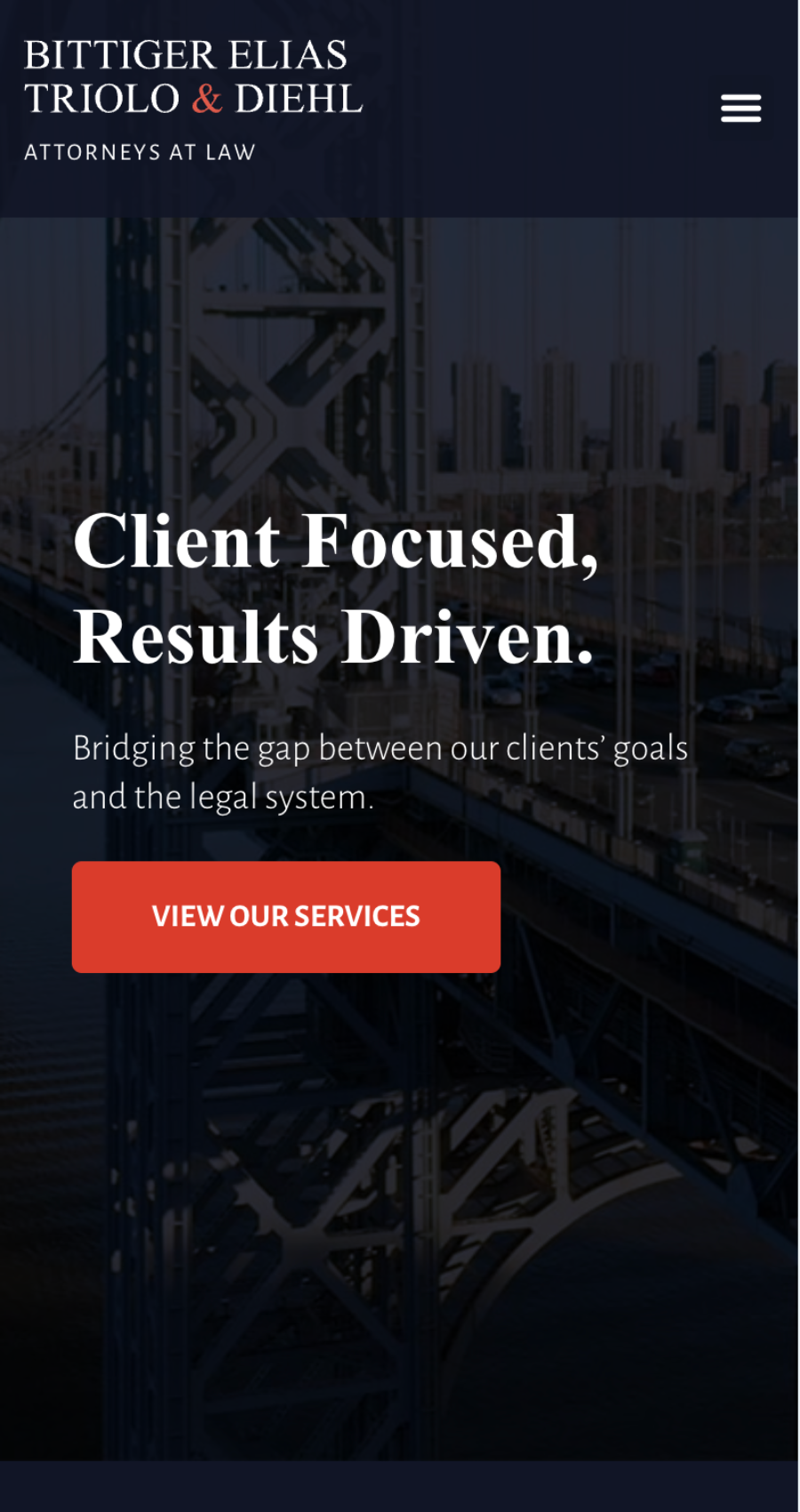 Homepage of Bittiger Elias Triolo & Diehl, a modern law firm website with a striking bridge background, firm name, slogan, and a bold red "View Our Services" button.