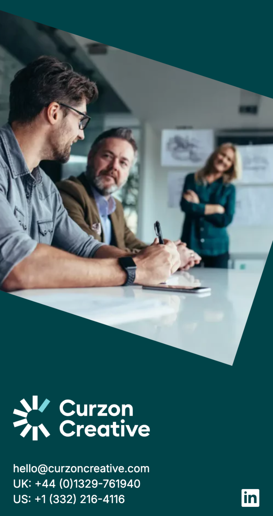 Three people in a modern office: two men sitting and talking at a table with papers, while a woman stands smiling in the background. Business contact details for Curzon Creative’s marketing firm website are visible.
