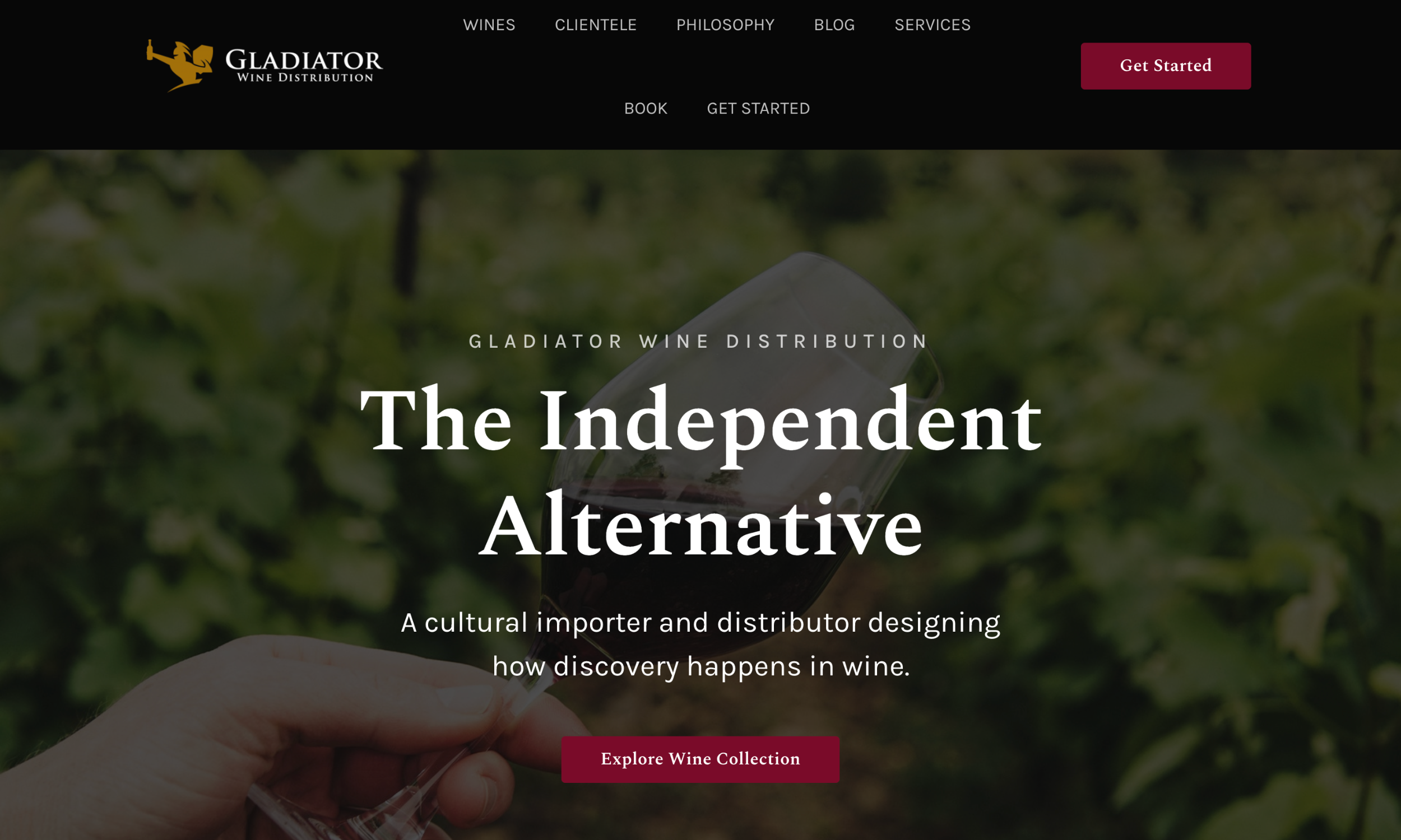 A hand holds a glass of red wine in a vineyard; overlay text promotes Gladiator Wine Distribution as an independent importer and distributor, with expertise in wine website design to elevate your brand online.