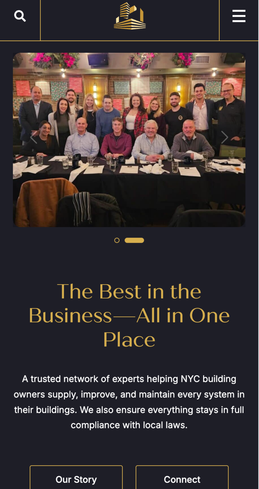 A group of twelve people pose together behind a table at a restaurant. The website text below promotes NYC building management services and showcases expertise in property developer website design.