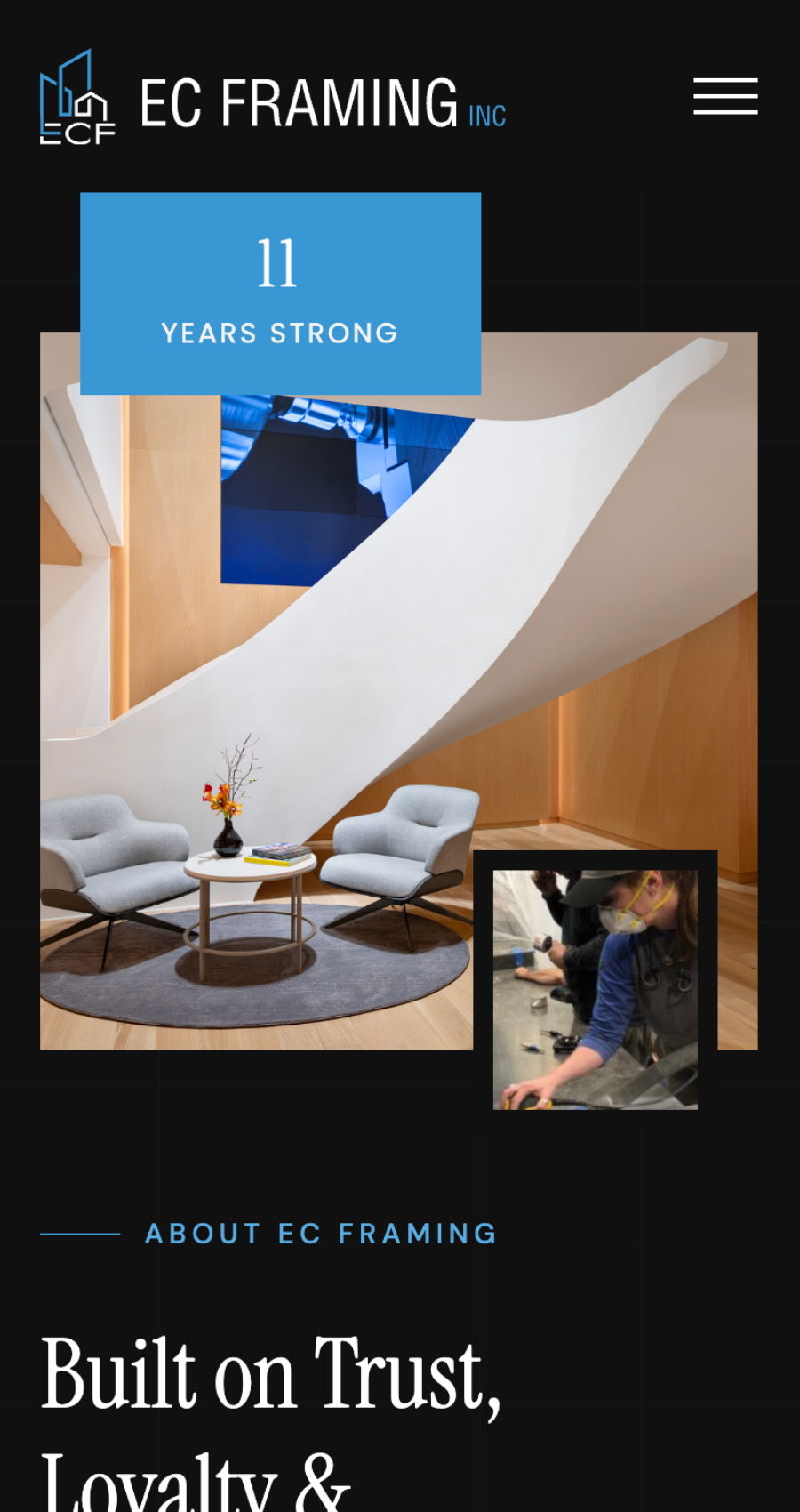 A modern office lobby with a white curved staircase, two gray chairs, a round table with decor, and an inset photo of workers handling tools. The header reads "11 Years Strong.