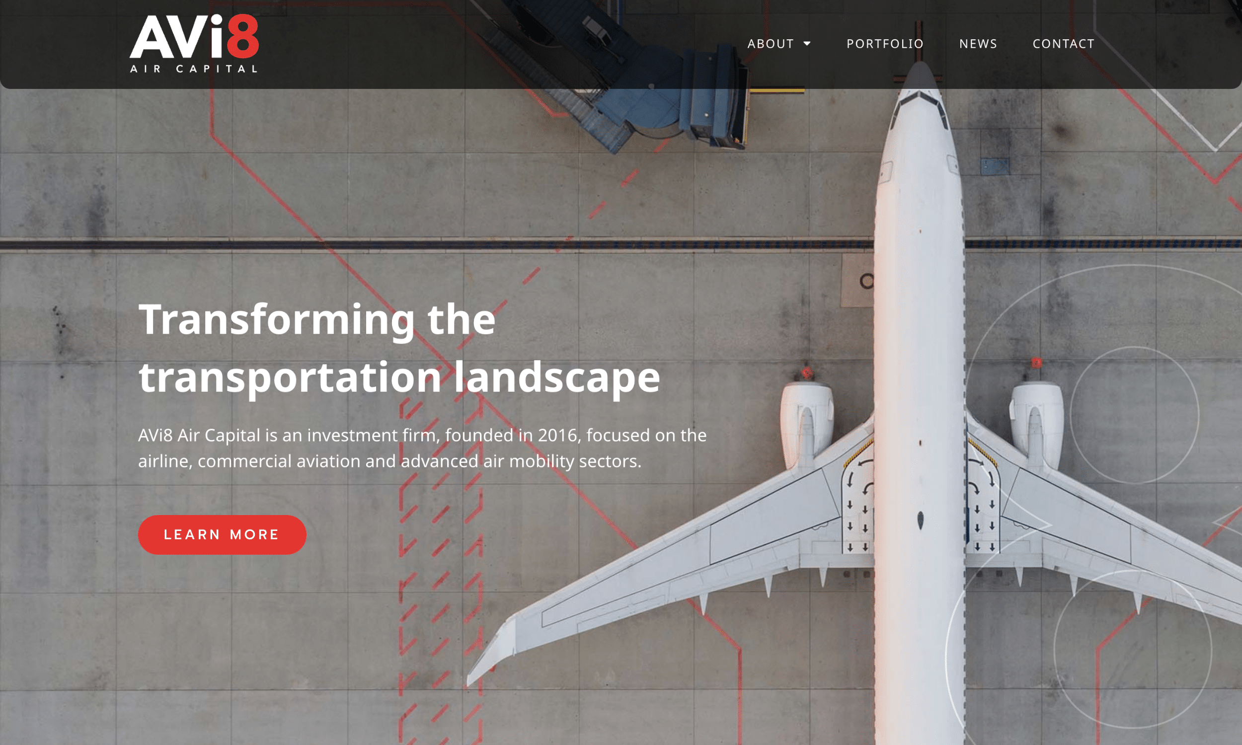 Aerial view of a commercial airplane on a tarmac with the text: "Transforming the transportation landscape" and navigation menu at the top.