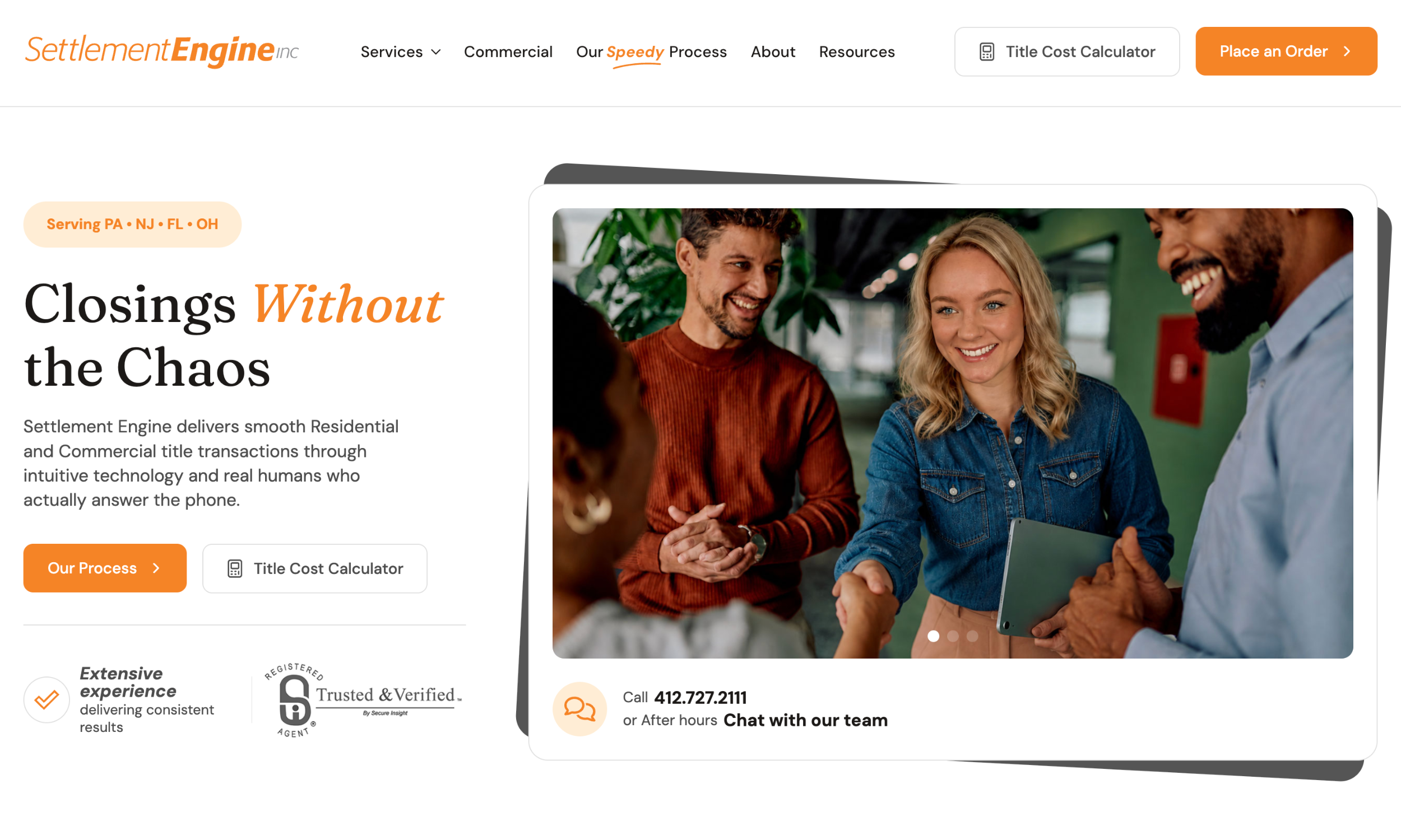 A group of four people smile and shake hands in a modern office. The website offers title cost calculators and settlement services.